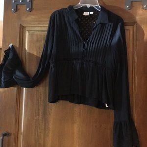 Long sleeved black blouse size S.
